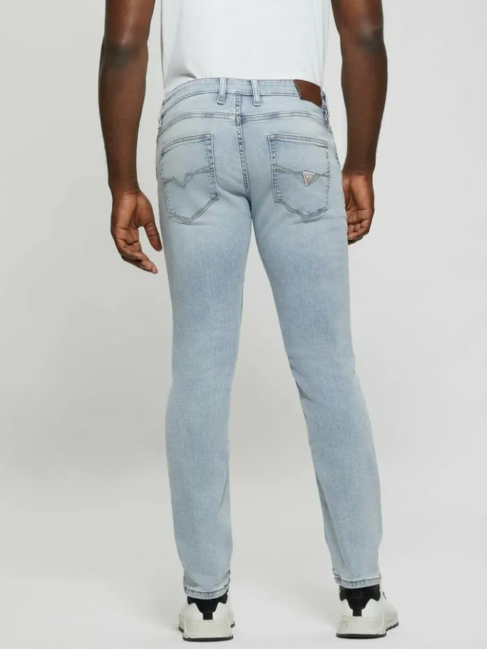 Men GUESS Jeans and Denim Distressed LowRise Slim Straight Jeans Light Sail