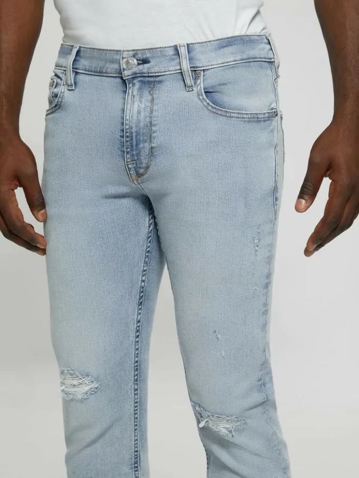 Men GUESS Jeans and Denim Distressed LowRise Slim Straight Jeans Light Sail