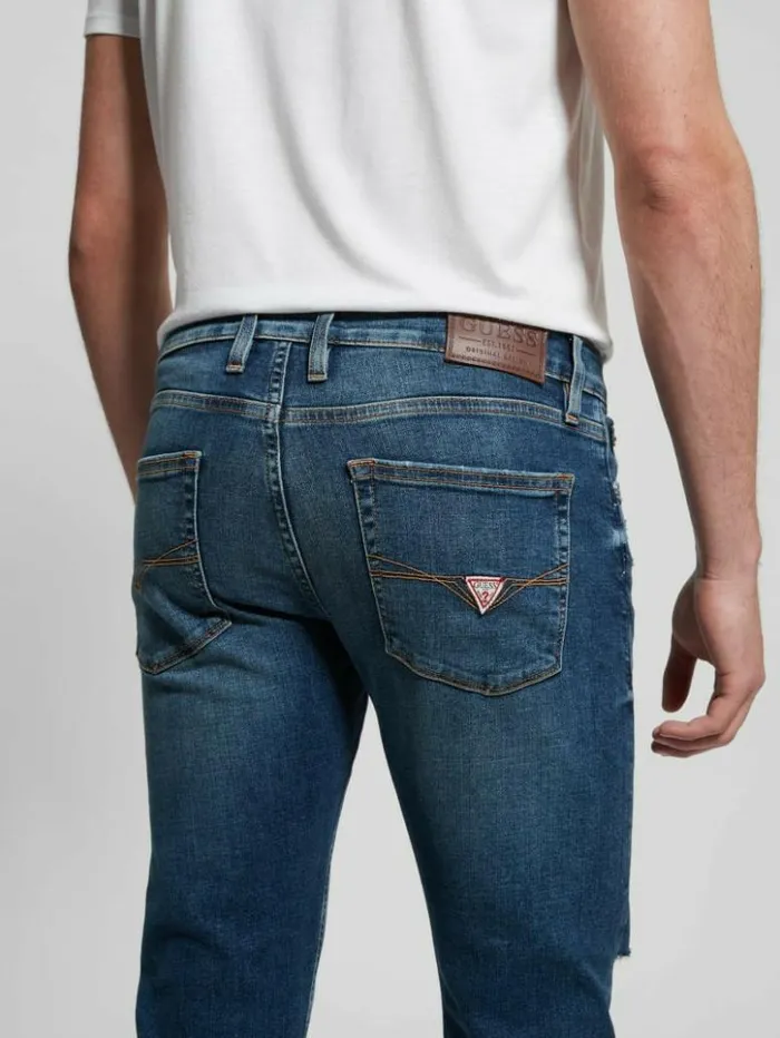 Men GUESS Jeans and Denim Slim Tapered Jeans Escape Destroy